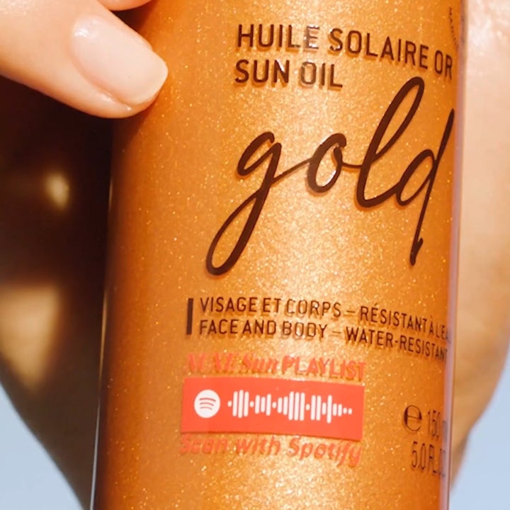 Nuxe Sun Tanning Oil Gold 150 ml suojaava aurinkoöljy SPF 50 antaa kultaista hohdetta ja sisältää Spotify koodin