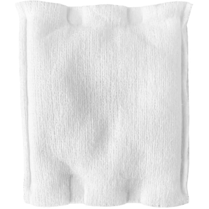 Topz Premium The Cleansing Pad 40 kpl ihonhoitoväline on valkoinen suorakaiteen muotoinen ja pystyuritettu vanulappu.