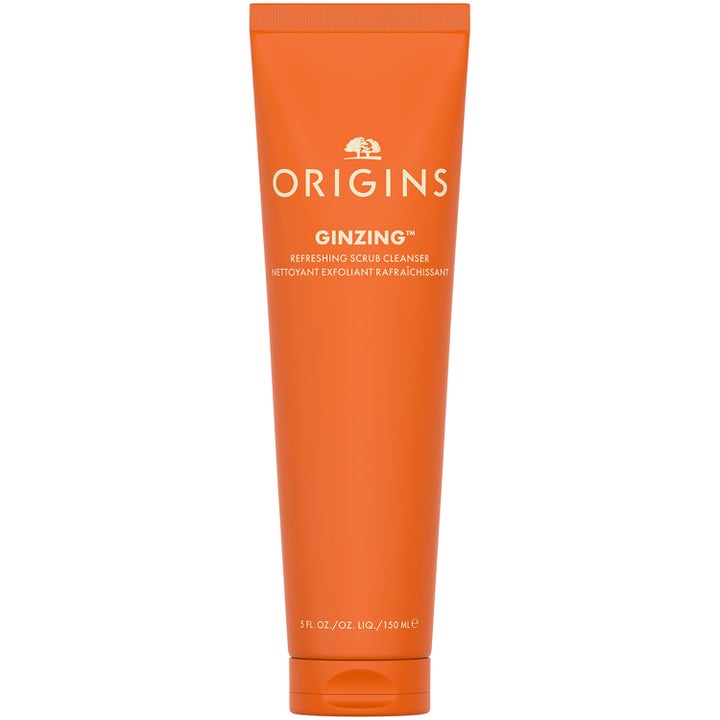 Origins GinZing Refreshing Scrub Cleanser 150 ml kirkastava puhdistusaine oranssissa tuubissa valkoisella tekstillä.
