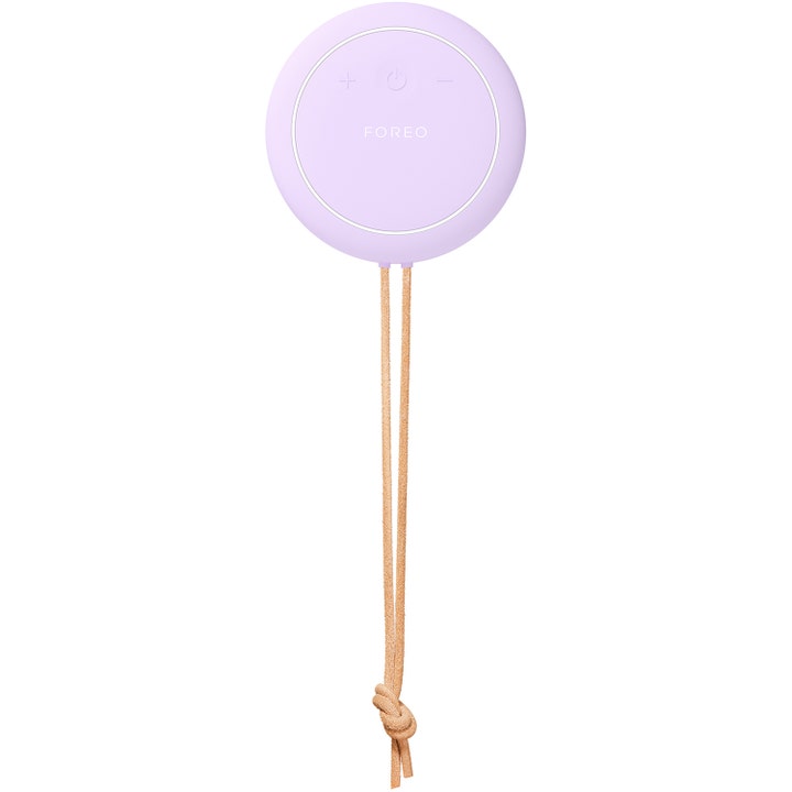 FOREO LUNA 4 body Lavender 1 kpl syväpuhdistava vartaloharja on pyöreä vaaleanliila silikonilaite ripustusnarulla.