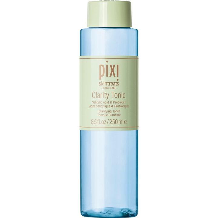 Pixi Clarity Tonic 250 ml puhdistava kasvovesi kirkastaa ihoa sinisessä pullossa, jossa on vihreä korkki.