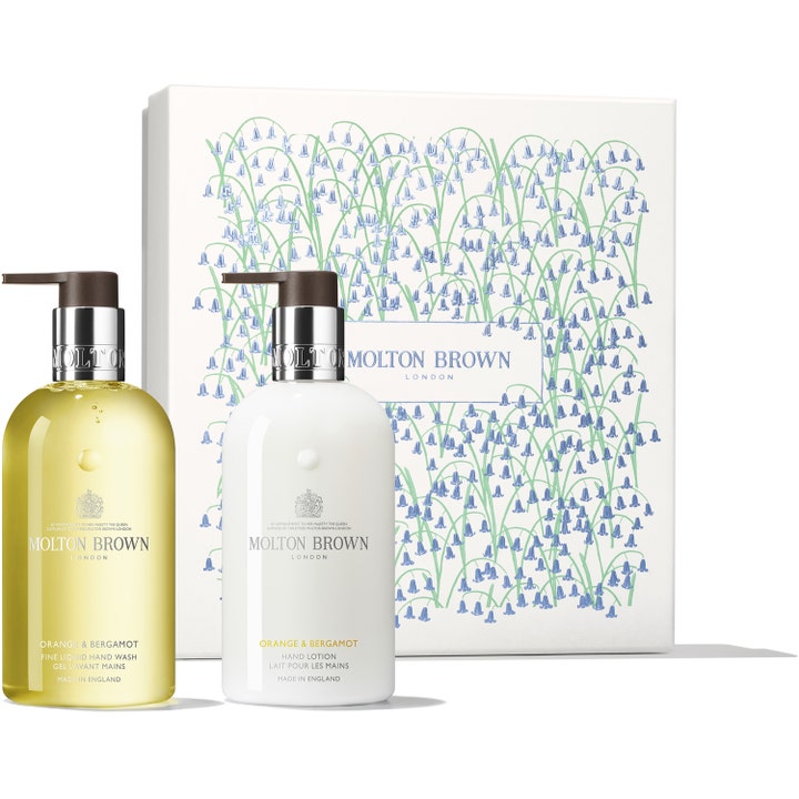 Molton Brown Orange & Bergamot käsisetti puhdistava saippua ja kosteuttava voide kukkakuvioisessa lahjapakkauksessa.