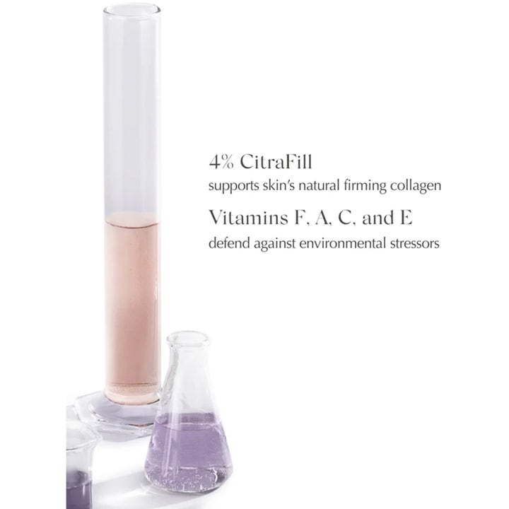 Kiinteyttävä Exuviance CitraFirm FACE Oil 27 ml kasvoöljy ja laboratoriolasit joissa on CitraFill-yhdistettä