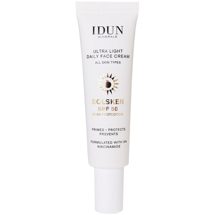 IDUN Minerals Solsken Ultra Light Daily Face Cream SPF 50 30 ml kasvovoide valkoisessa tuubissa kultaisella aurinkologolla.