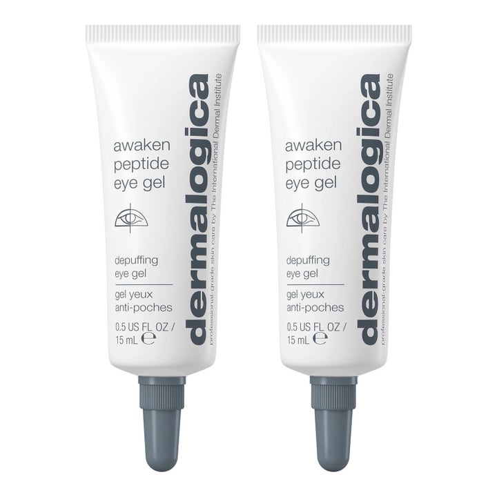 Dermalogica Awaken Peptide Eye Gel 15 ml turvotusta vähentävä silmänympärysgeeli kahdessa valkoisessa tuubissa harmailla korkeilla
