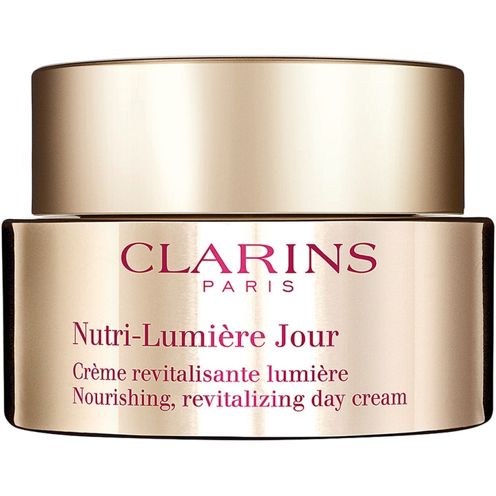 Clarins Nutri-Lumière Jour 50 ml ravitseva ja kirkastava päivävoide tyylikkäässä kultaisessa purkissa.
