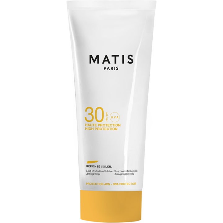 Matis Réponse Soleil Sun Protection Milk SPF 30 ikääntymistä estävä aurinkomaito valkoisessa tuubissa keltaisella korkilla.