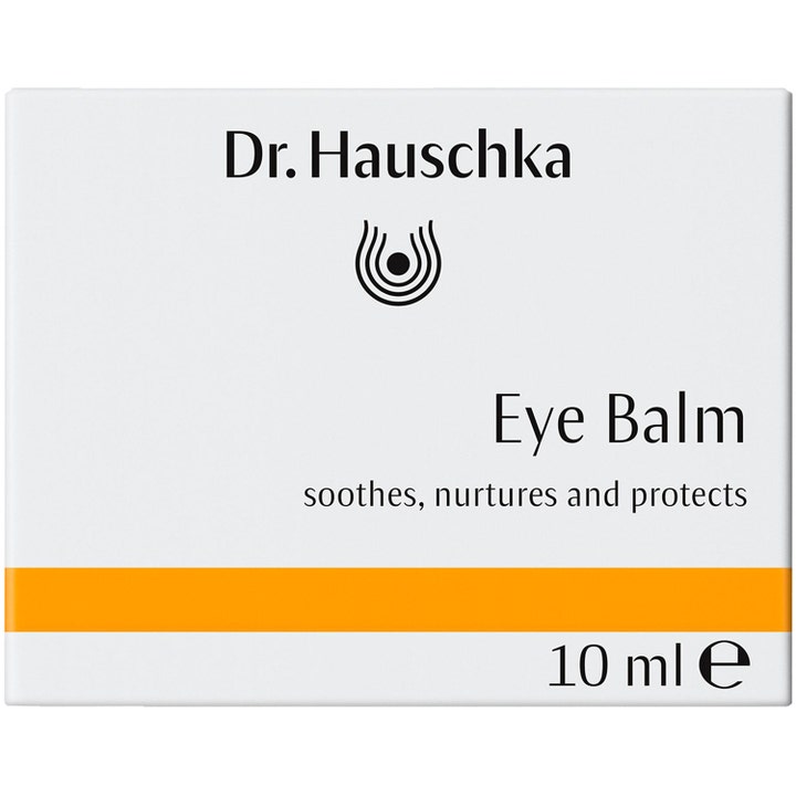 Dr. Hauschka Eye Balm 10 ml rauhoittava silmänympärysvoide valkoisessa pakkauksessa, jossa on oranssi raita.
