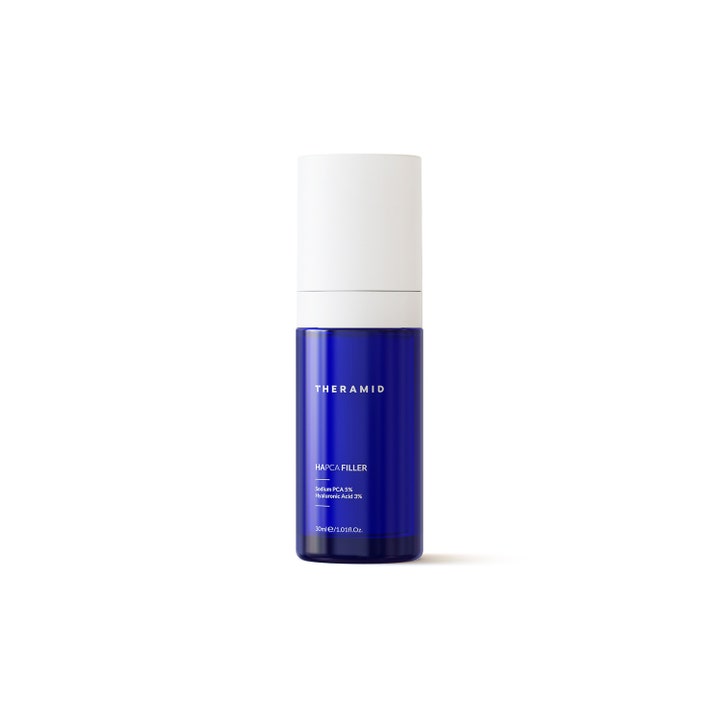 Theramid HAPCA Filler 30 ml kosteuttava ja täyteläisyyttä antava seerumi sinisessä pullossa valkoisella korkilla.