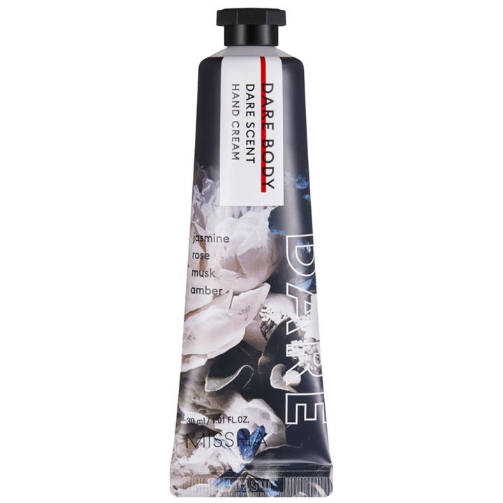 Missha Dare Body Dare Scent 30 ml kosteuttava käsivoide pehmentää ihoa kukkakuvioisessa tuubissa, jossa on musta korkki.