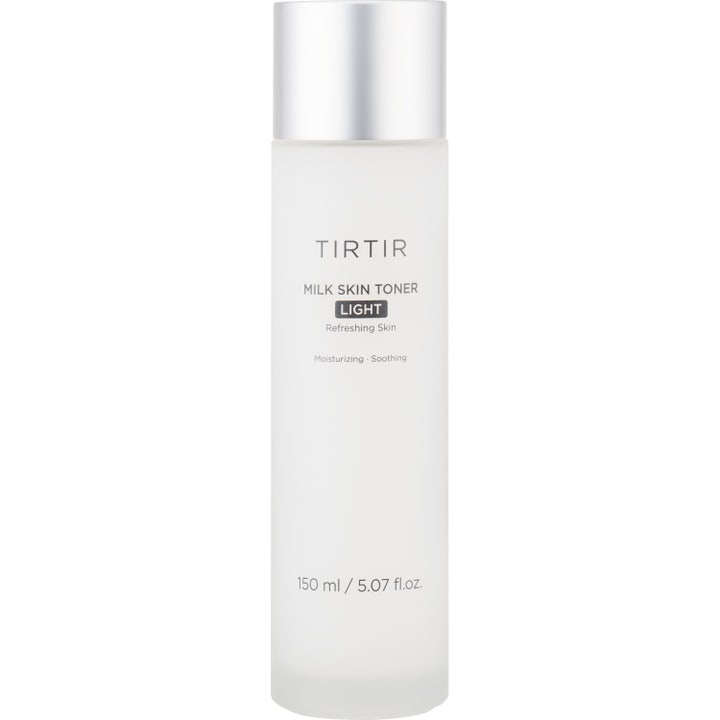 TIRTIR Milk Skin Toner Light 150 ml rauhoittava kasvovesi huurteisessa pullossa jossa on tyylikäs hopeinen korkki.