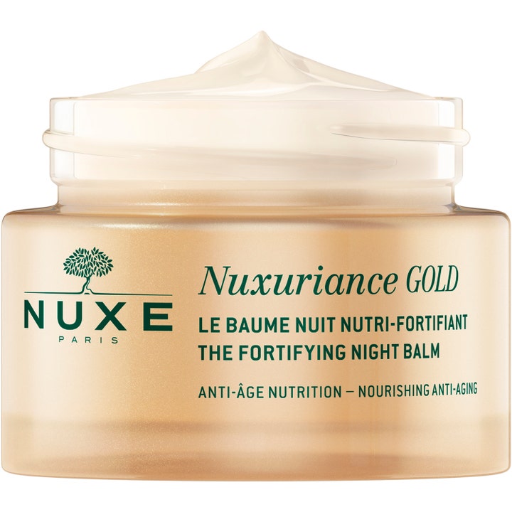 Nuxe Nuxuriance Gold Night Balm 184 g ravitseva yövoide, täyteläinen vaalea koostumus kultaisessa lasipurkissa.