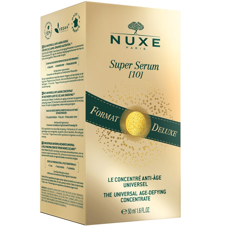 Nuxe Super Serum 50 ml anti-aging-seerumi kultaisessa pahvipakkauksessa jossa lukee Format Deluxe.