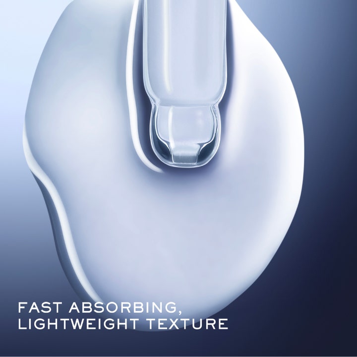 Lancôme Génifique Ultimate Serum 50 ml korjaava seerumi jonka kevyt nopeasti imeytyvä koostumus näkyy pipetin alla.