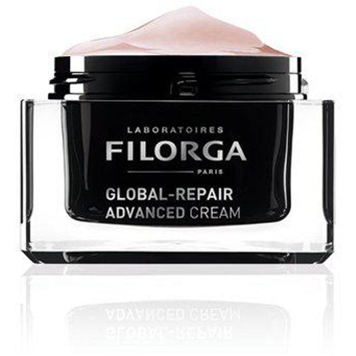 Filorga Global-Repair Advanced Cream 50 ml uudistava kasvovoide mustassa lasipurkissa, jossa on vaaleanpunainen koostumus.