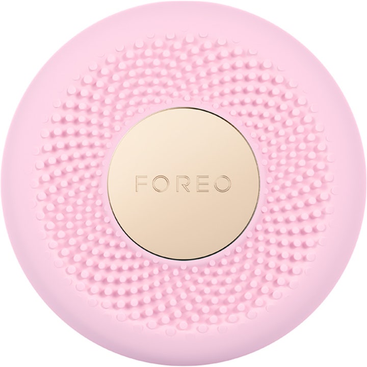FOREO UFO™ 3 Pearl Pink 1 kpl syväkosteuttava kasvohoitolaite, vaaleanpunainen nystyräinen pinta ja kultainen keskiosa.