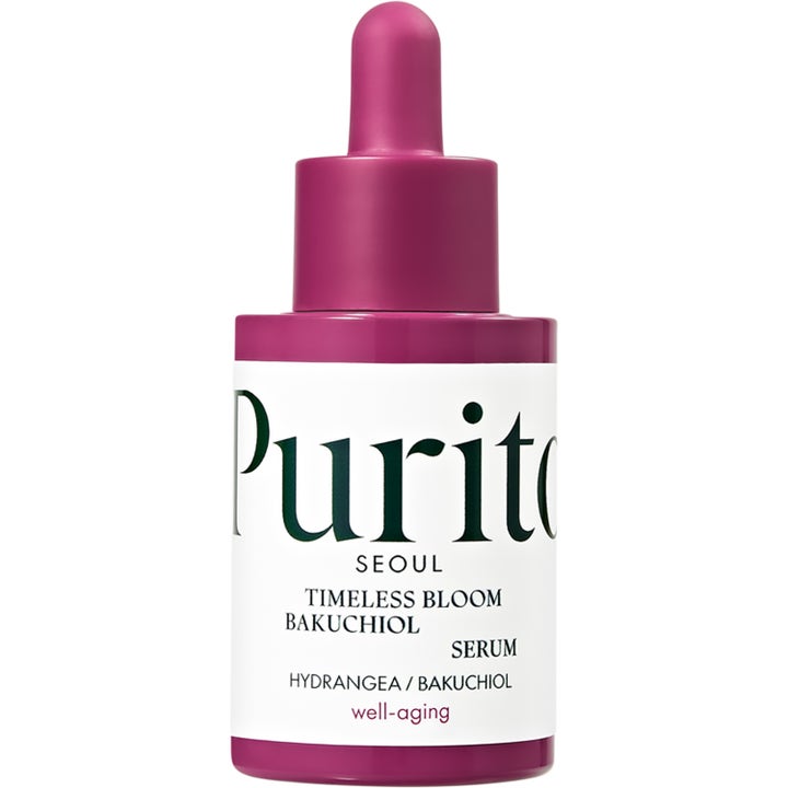 Purito Seoul Timeless Bloom Bakuchiol Serum 30 ml uudistava well-aging kasvoseerumi lila pullossa, jossa on pipetti.
