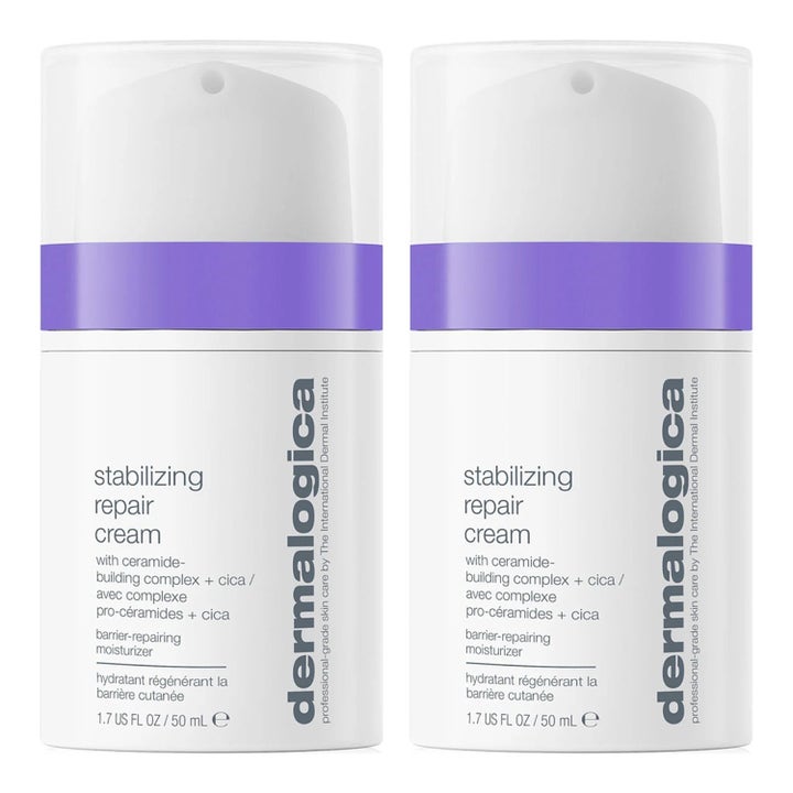 Dermalogica Stabilizing Repair Cream 50 ml vahvistava kasvovoide kahdessa valkoisessa violettiraitaisessa pumppupullossa.