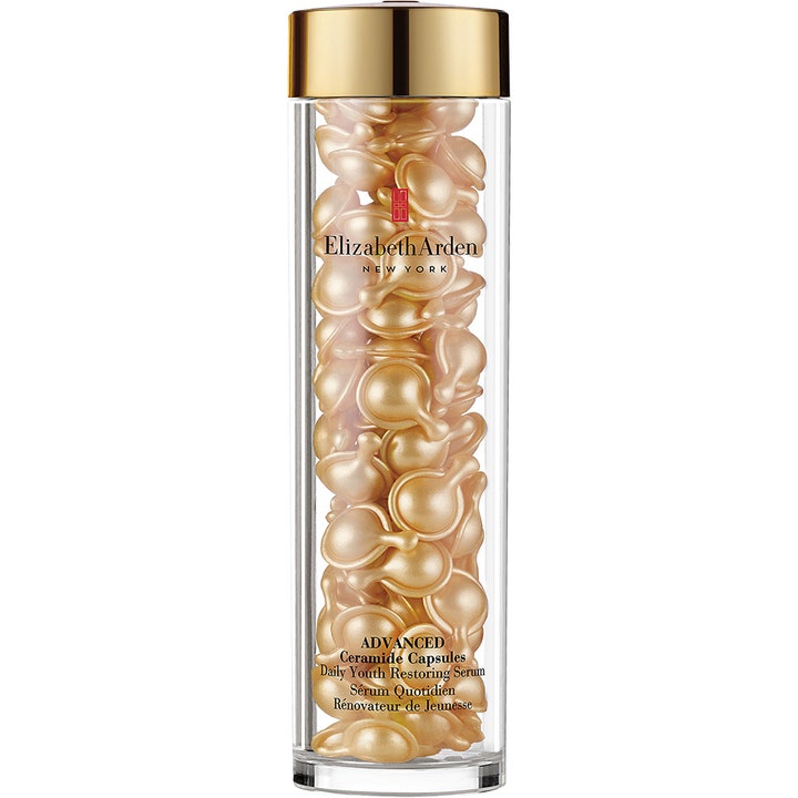 Elizabeth Arden Advanced Ceramide Capsules 90 kpl uudistava seerumi kultaisia kapseleita kirkkaassa kultakantisessa purkissa.