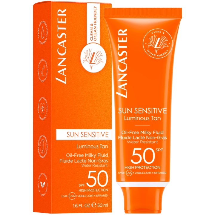 Lancaster Sun Sensitive Oil Free Milky Fluid SPF50 50 ml rauhoittava aurinkovoide oranssissa tuubissa ja pakkauksessa.