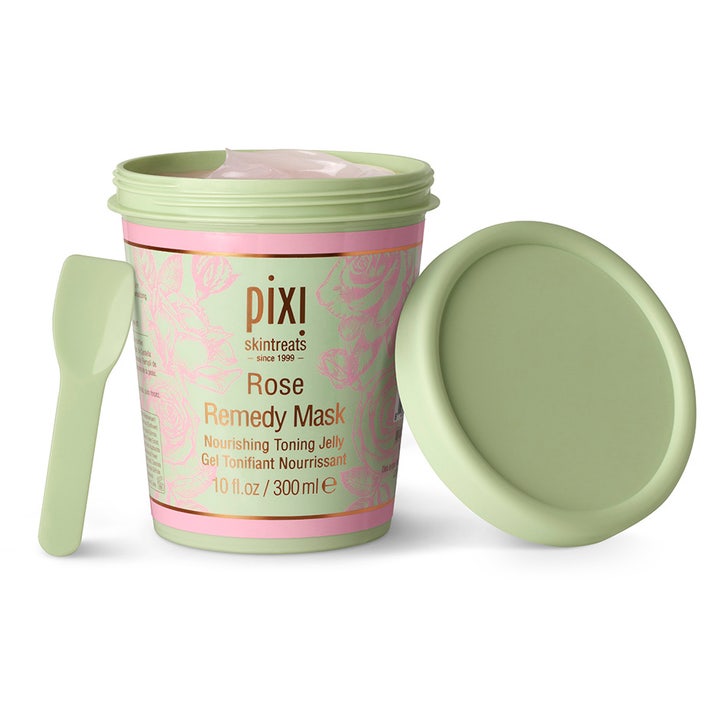 Pixi Rose Remedy Mask 300 ml ravitseva kasvonaamio vihreässä purkissa, jossa pinkkiä hyytelöä ja levityslasta.