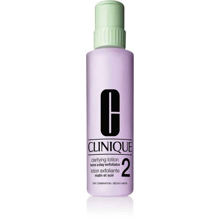 Clinique Clarifying Lotion 2 kuoriva kasvovesi kuivalle sekaiholle violetissa muovipullossa.