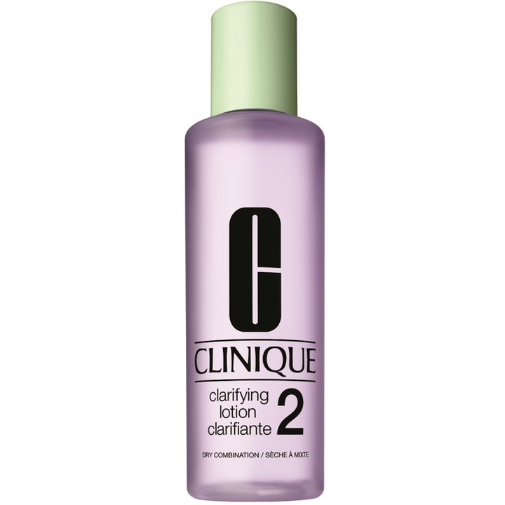 Clinique Clarifying Lotion 2 kuoriva kasvovesi seka-iholle liilassa pullossa vaaleanvihreällä korkilla.