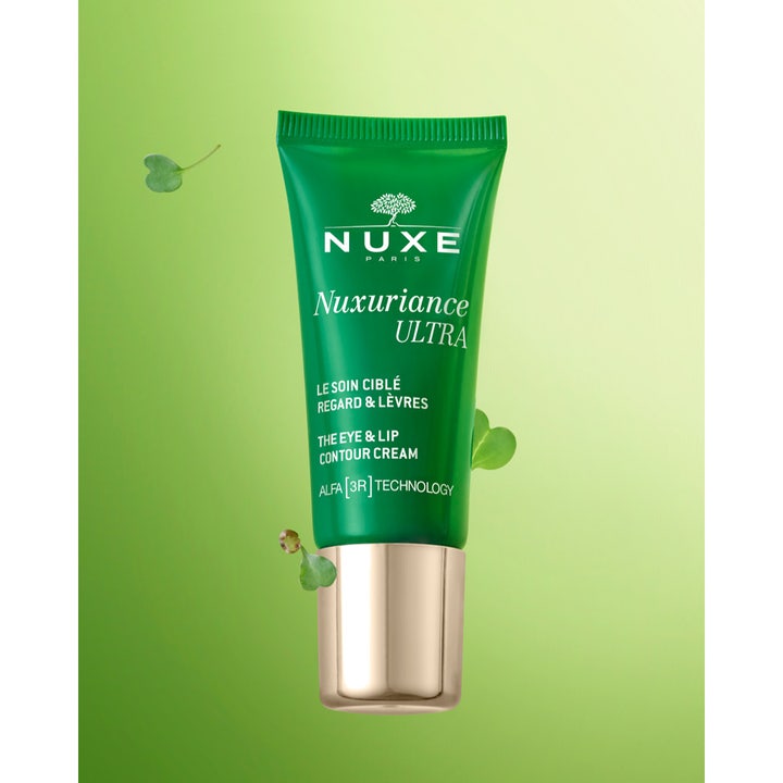 Nuxe Nuxuriance Gold The Radiance Eye Balm 15 ml silmänympärysvoide vihreässä Ultra-tuubissa kultaisella korkilla.