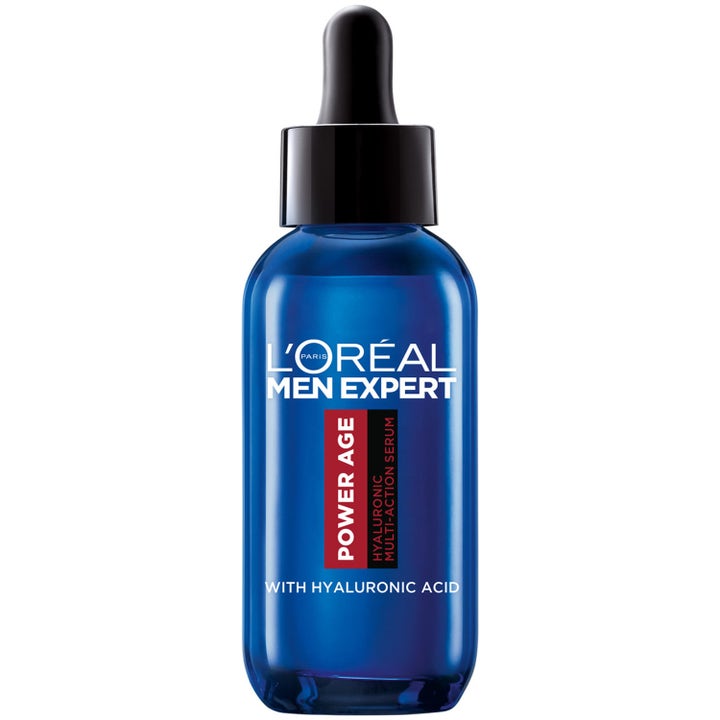 L'Oréal Men Expert Power Age Hyaluronic Multi-Action Serum kosteuttaa ihoa sinisessä lasipullossa jossa on musta pipetti