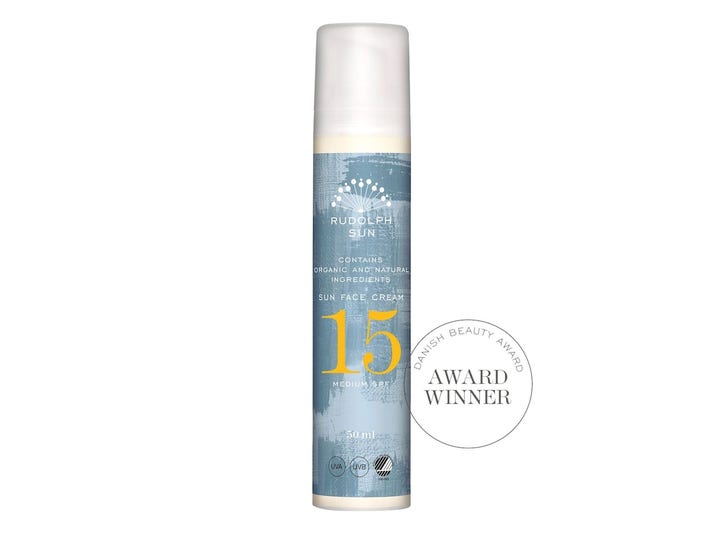 Rudolph Care Sun Face Cream SPF 15 50 ml suojaava aurinkovoide kasvoille valkoisessa pumppupullossa sinisellä etiketillä.