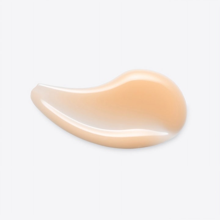 Kirkastava Origins GinZing Into the Glow Brightening Serum 30 ml on koostumukseltaan persikkainen geeli.