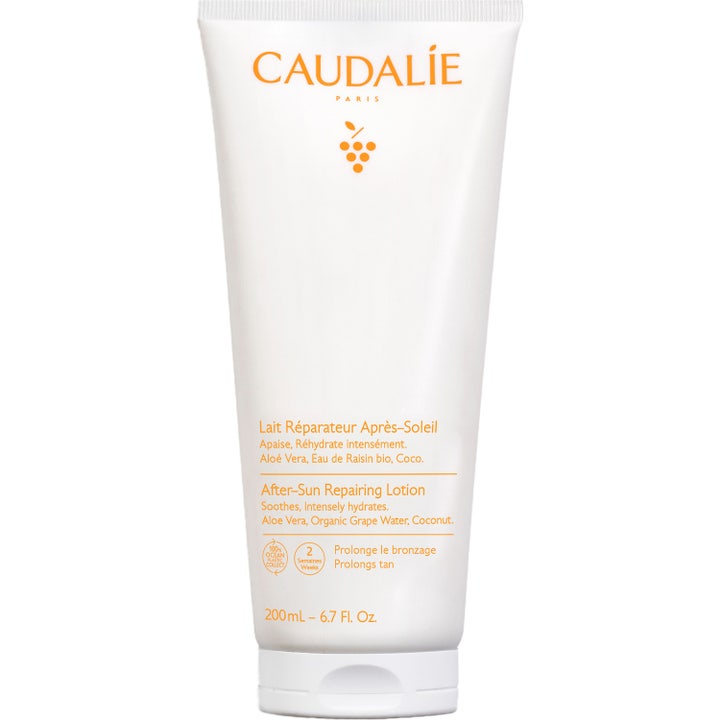 Caudalie After-Sun Repairing Lotion 200 ml rauhoittava after sun valkoisessa tuubissa oransseilla yksityiskohdilla