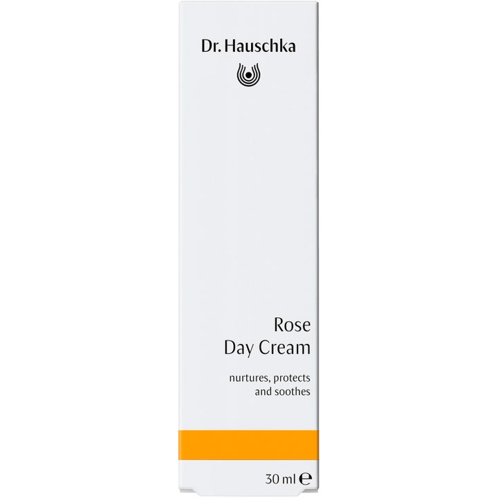 Dr. Hauschka Rose Day Cream 30 ml ravitseva ja suojaava päivävoide valkoisessa pakkauksessa oranssilla raidalla.