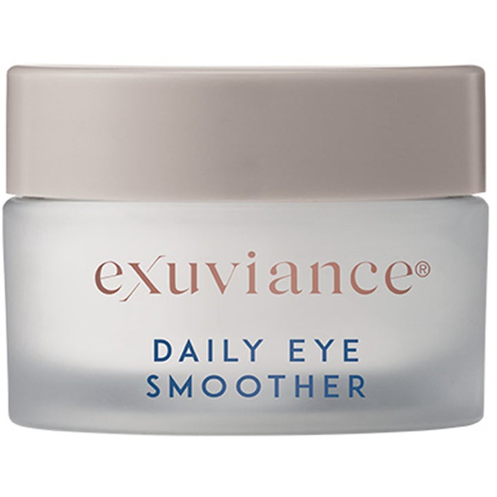 Exuviance Daily Eye Smoother 15 ml silottava silmänympärysvoide huurrelasipurkissa hiekanvärisellä kannella