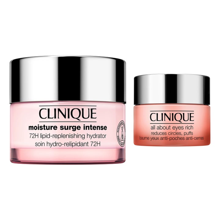 Clinique Moisture Surge ja All About Eyes Rich kosteuttavat voiteet vaaleanpunaisissa purkeissa hopeisilla kansilla.