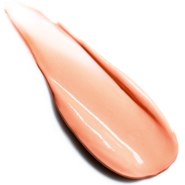 Clarins Extra-Firming Energy Day Cream 50 ml heleyttävä päivävoide ja sen hohtava persikkainen voidenäyte.