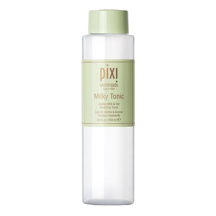 Pixi Milky Tonic 250 ml rauhoittava kasvovesi sisältää jojobamaitoa läpinäkyvässä pullossa vihreällä korkilla.