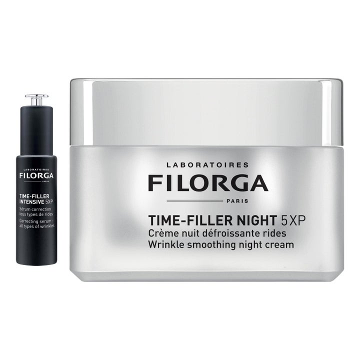 Filorga Time-Filler Night yövoide ja Intensive seerumi silottavat ryppyjä hopeisessa purkissa ja pipettipullossa.