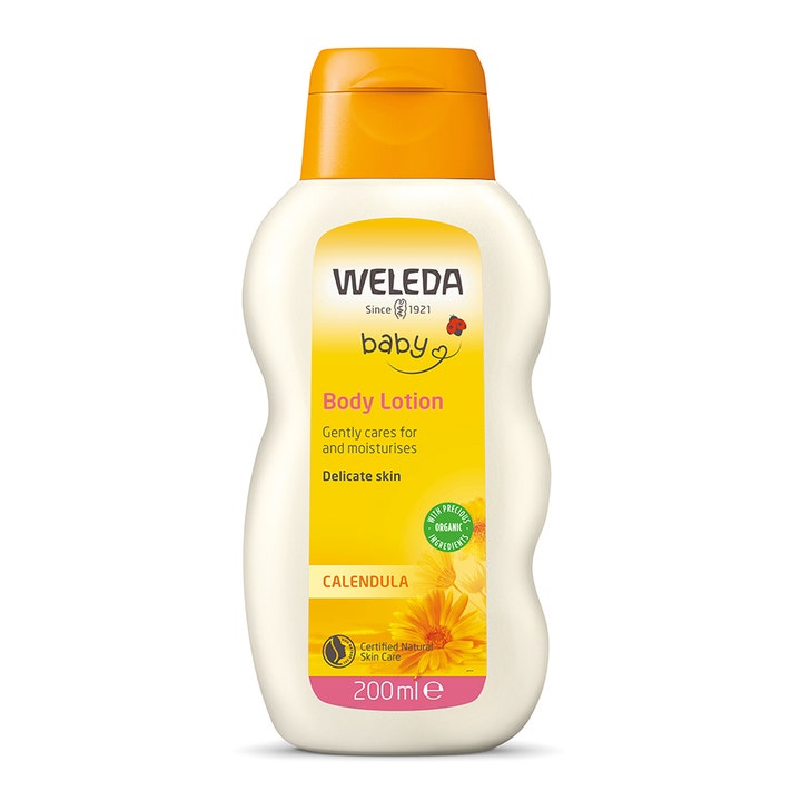 Weleda Baby Calendula Body Lotion 200 ml kosteuttava vartalovoide valkoisessa pullossa oranssilla korkilla