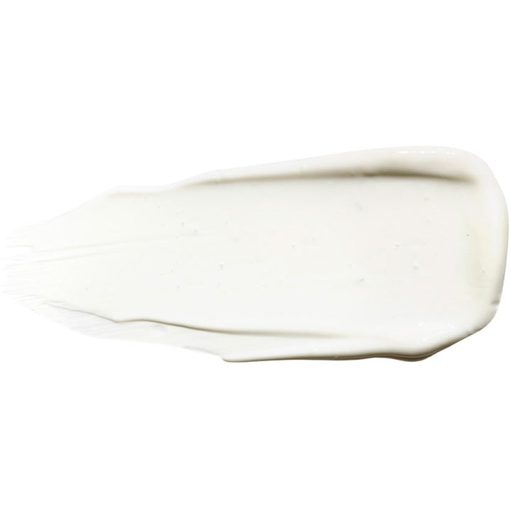 Exuviance Daily Corrector SPF35 40 g suojaava kasvovoide, jossa on valkoinen ja täyteläinen voidekoostumus.