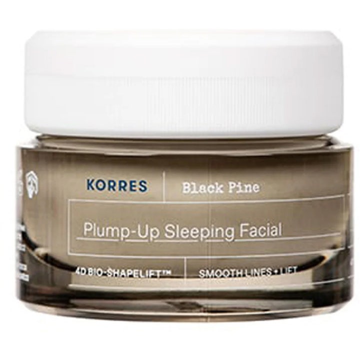 Korres Black Pine Plump-Up Sleeping Facial 40 ml kiinteyttävä yövoide tyylikkäässä tummassa lasipurkissa.