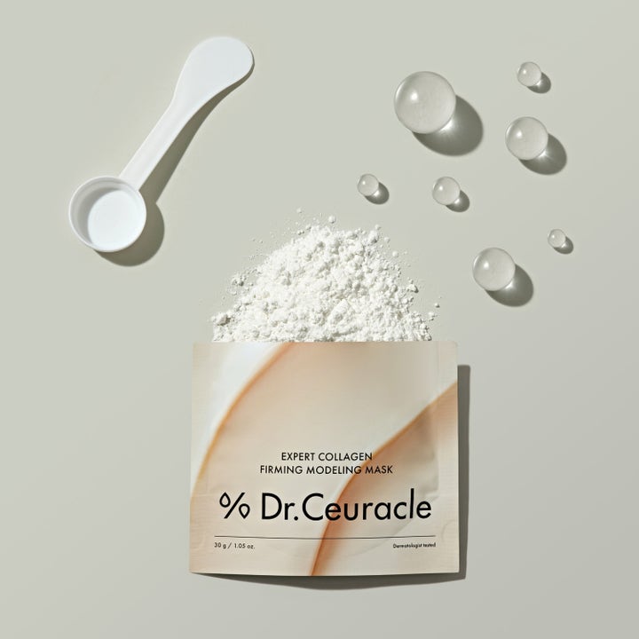 Dr. Ceuracle Expert Collagen Firming Modeling Mask 30 g kiinteyttävä naamiojauhe pussissa, mittalusikka ja pisaroita.