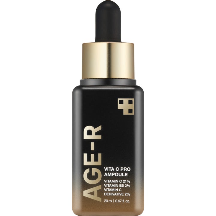 Medicube Age-R Vita C Pro Ampoule 20 ml kirkastava seerumi mustassa kultaliukuvärisessä pipettipullossa.