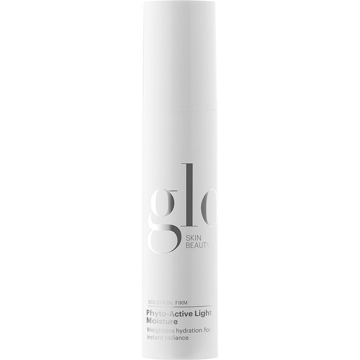 Glo Skin Beauty Phyto-Active Light Moisture kiinteyttävä ja heleyttävä kasvovoide valkoisessa pumppupullossa.