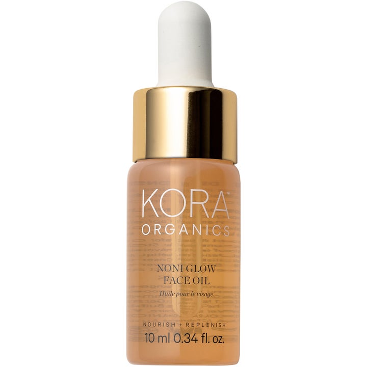Kora Organics Noni Glow Face Oil 10 ml ravitseva kasvoöljy kultaisella korkilla ja pipetillä varustetussa lasipullossa