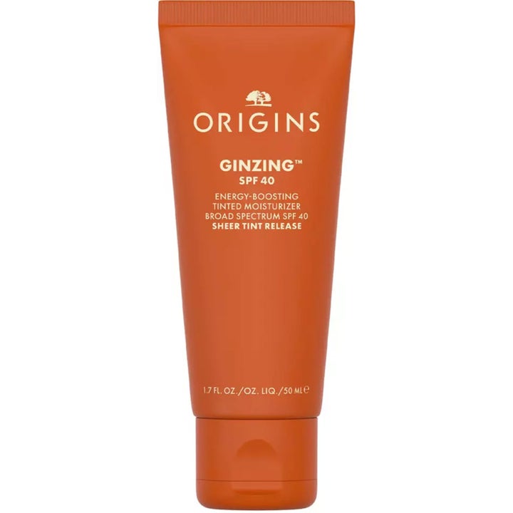 Origins GinZing SPF 40 Energy-Boosting Tinted Moisturizer 50 ml sävyttävä päivävoide oranssissa tuubissa.