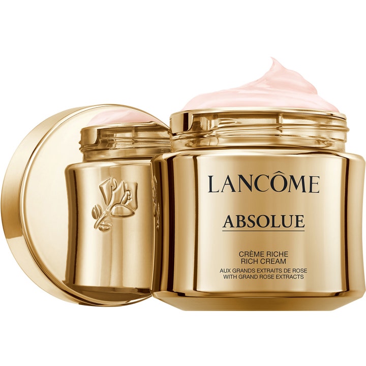 Lancôme Absolue Rich Cream 60 ml ravitseva päivävoide kultaisessa purkissa, jossa on vaaleanpunainen voidekoostumus.