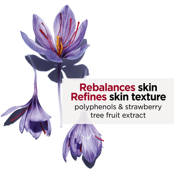 Clarins Hydra-Essentiel 30 ml seerumi tasapainottaa ihoa ja silottaa tekstuuria purppuraisten kukkien kera.